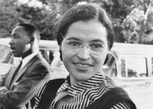 A 1955 snapshot of Rosa Parks sitting on a park bench near civil rights leader Martin Luther King, Jr. (Wikimedia Commons)