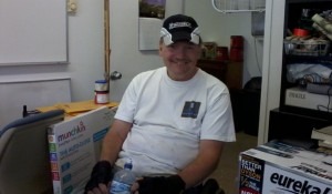 Key volunteer Dennis Drieling helps oversee food distribution at the North Denver Cares Food Pantry. (Marrton Dormish) 