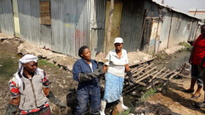 A "cash-for-work" project in the Mukuru neighborhood of Nairobi, Kenya. (Linda Ogwell/Oxfam East Africa via Wikimedia Commons)