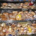 A rack of packaged bread waits for distribution at the North Denver Cares (NDC) food pantry in Broomfield, Colo. While the Summer Food Service Program only operates when school is out, NDC is open year-round. (Marrton Dormish)