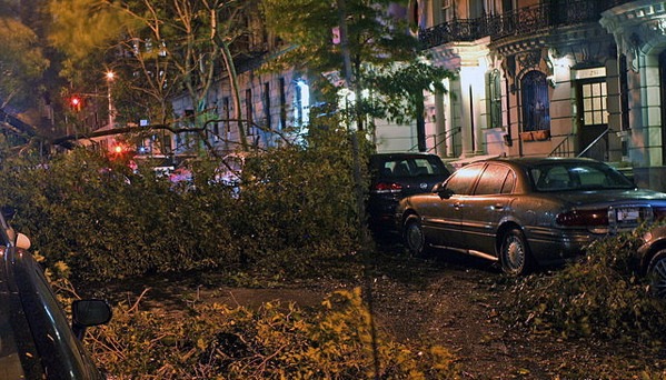 Downed trees due to Hurricane Sandy litter a street on New York City's upper west side. (Mr. Choppers via Wikimedia Commons)