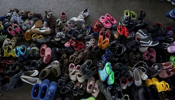 Shoes left behind in Hungary by child refugees. (Mstyslav Chernov via Wikimedia Commons)