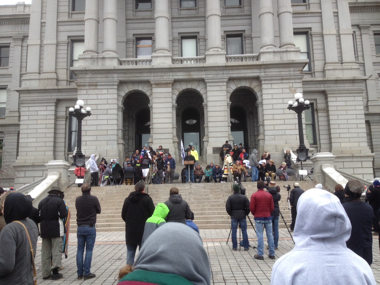Cheyenne and Arapaho tribal leaders and memorial runners joined state representatives on the steps of the state capitol on Nov. 29 to remember the Sand Creek Massacre. (Marrton Dormish)